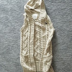Sleeveless long sweater